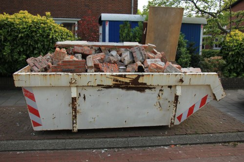 Street litter clearance in a busy London area