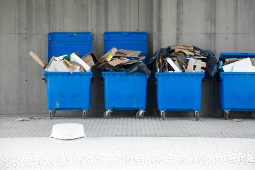 Professional house clearance team removing furniture from a London property