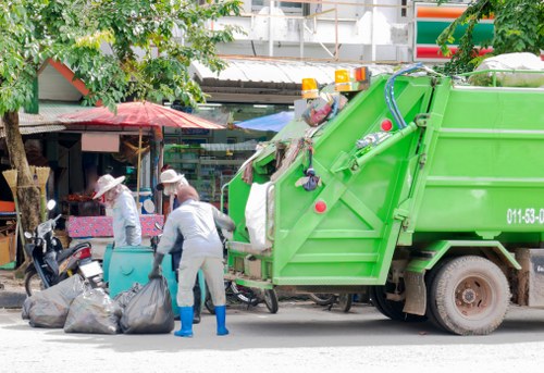 Professional team handling bulky waste collection in a London street