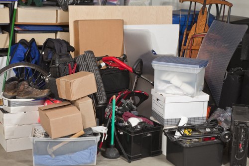 Household rubbish and furniture being cleared from a London property