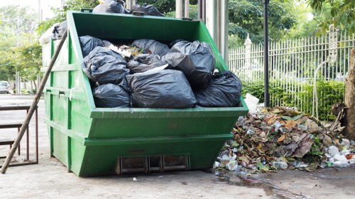 Eco-friendly loft clearance in London with waste being separated for recycling